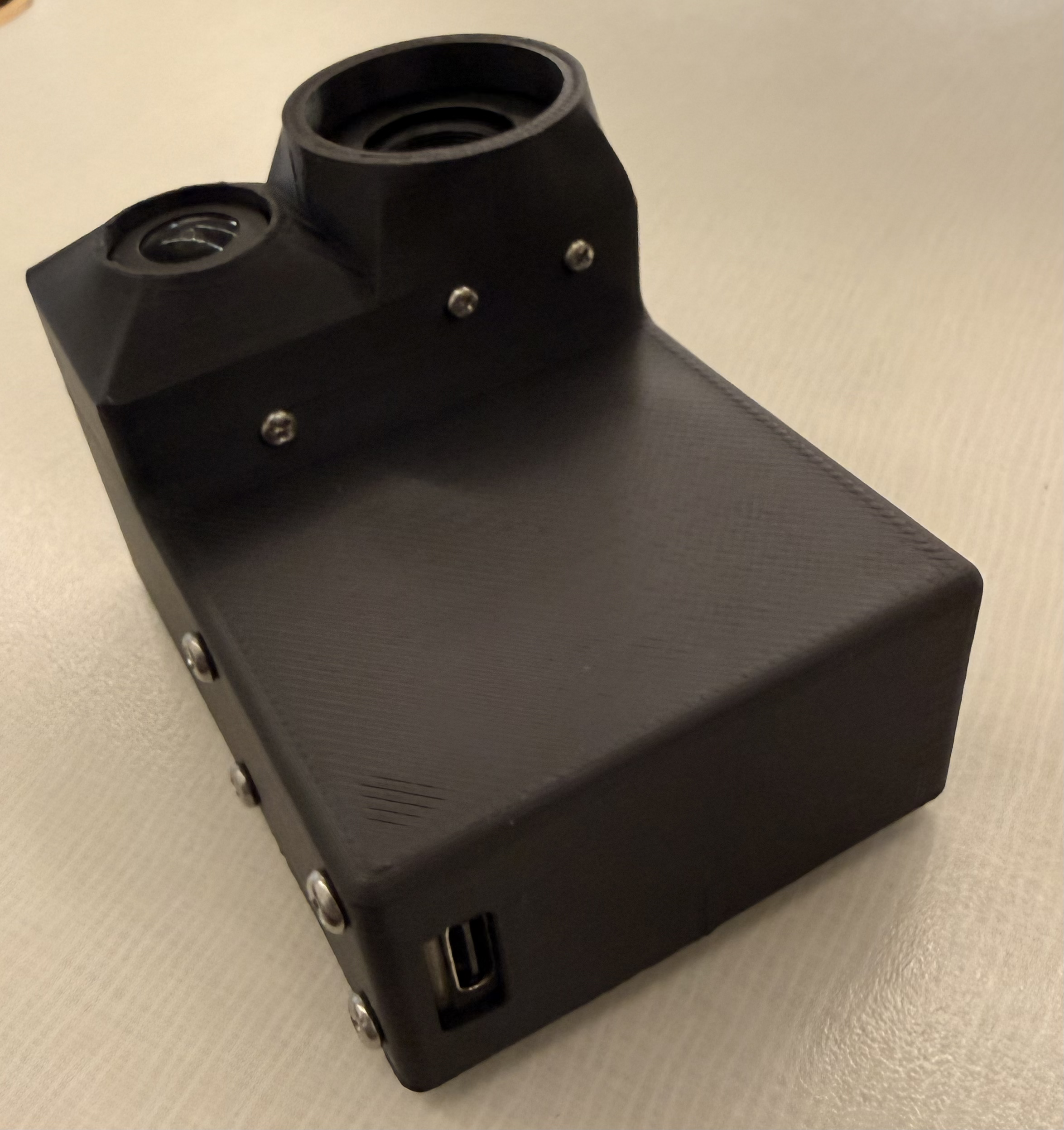 V2 shell rear view showing single USB-C output port
